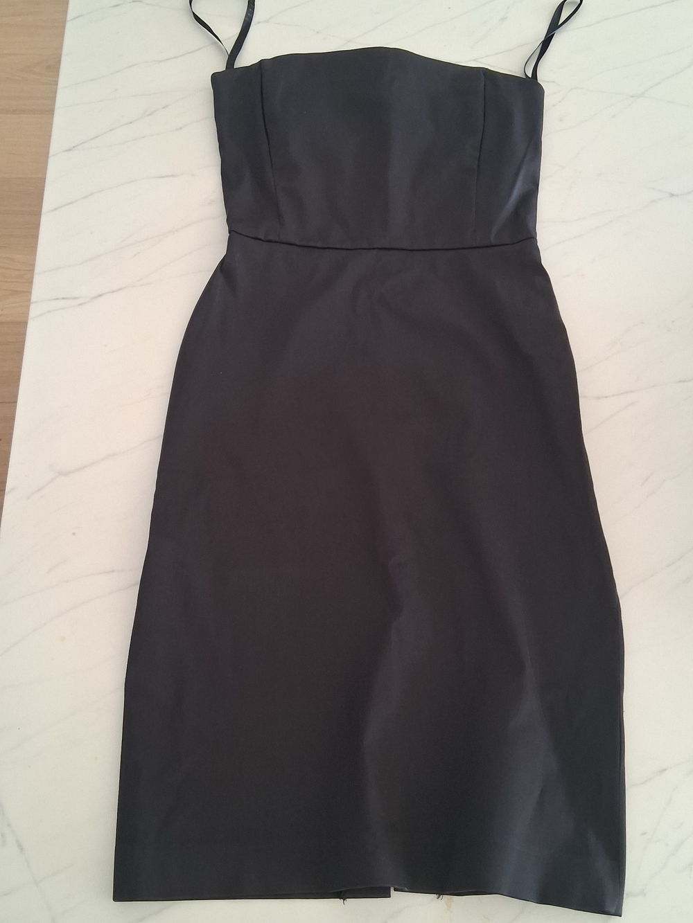 Timeless Little Black Dress. Classic Black Spaghetti-Strap Sheath Dress